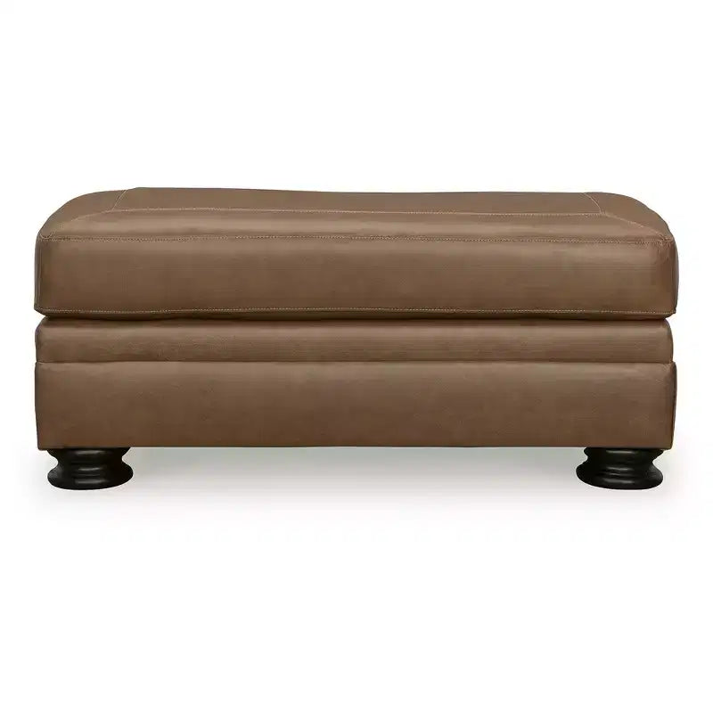 Pouffe traditionnel en cuir avec pieds tournés décoratifs – Caramel